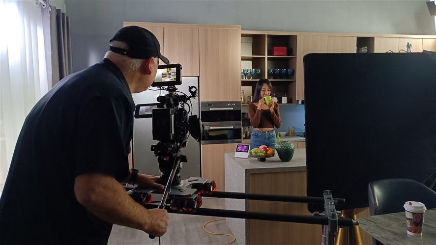 Branded content production inside a modern kitchen set in Shenzhen