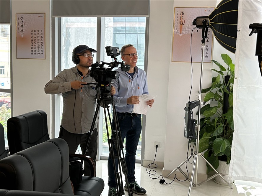Corporate video crew working inside a Shenzhen office